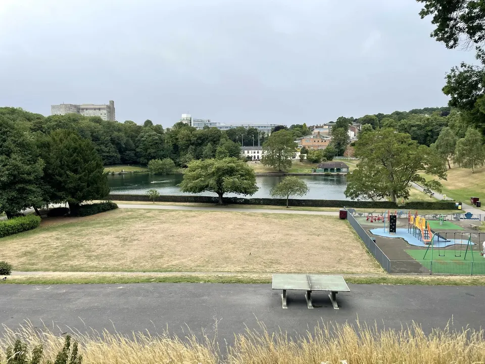 Summer view across the park to the play area and table tennis table, Crookes Valley Park